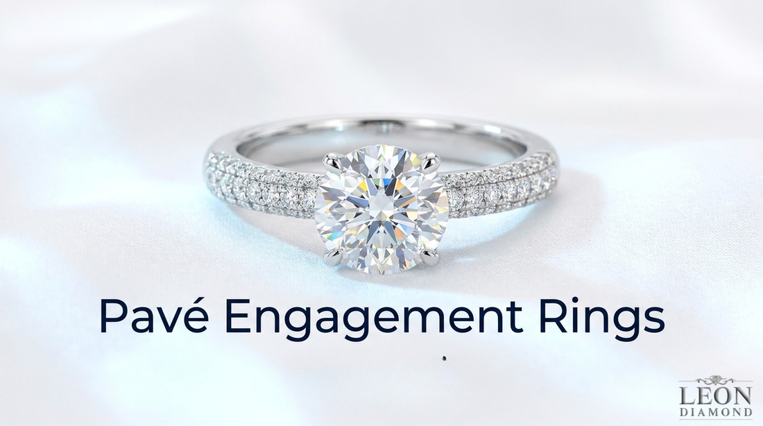 avé engagement ring with a round center diamond and diamond-set band.