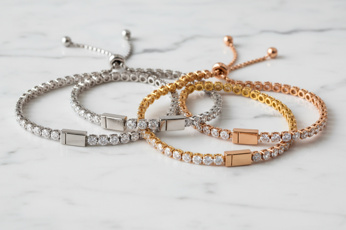 Diamond tennis bracelet with custom engraving of initials on gold clasp symbolizing timeless elegance and personal story.