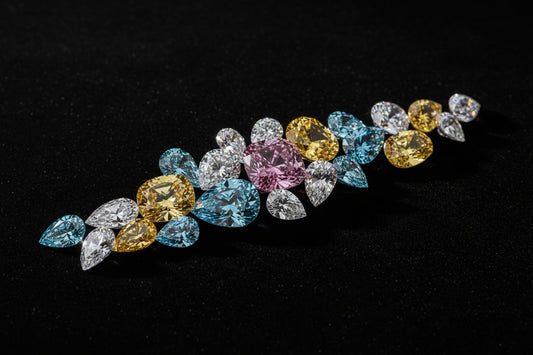 A stunning editorial display of rare fancy-color diamonds arranged on velvet.