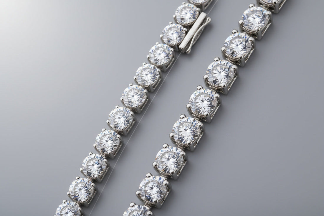 Close-up of a genuine diamond tennis bracelet next to a fake imitation on a neutral background, highlighting differences in sparkle, metal, and craftsmanship.