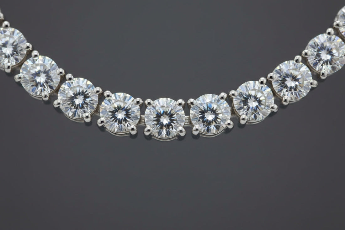 Detailed close-up of a tennis chain showing individual links, prongs, and diamonds, emphasizing craftsmanship, symmetry, and flexibility.