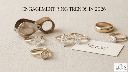 Collection of modern engagement rings with oval and marquise diamonds in yellow gold settings.