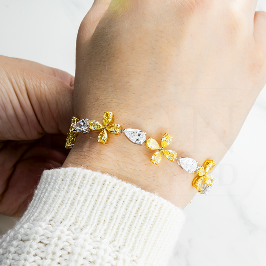 14K Two Tone Pear Cut White & Fancy Yellow Diamond Blooming Bracelet Bracelets