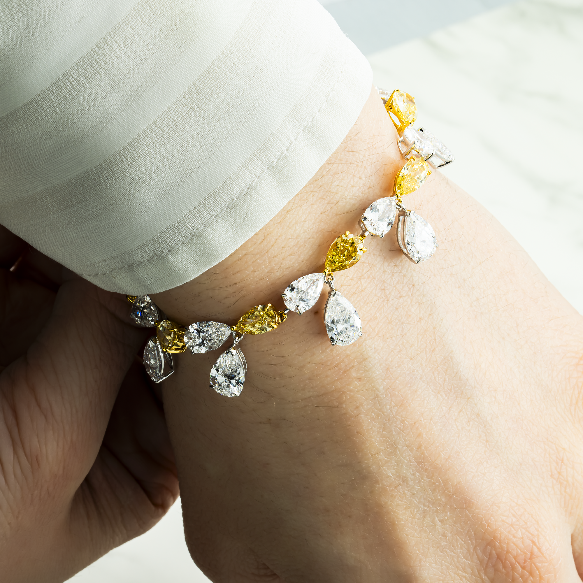 14K Two Tone Pear Cut White & Fancy Yellow Diamond Dangle Bracelet 33.63ct