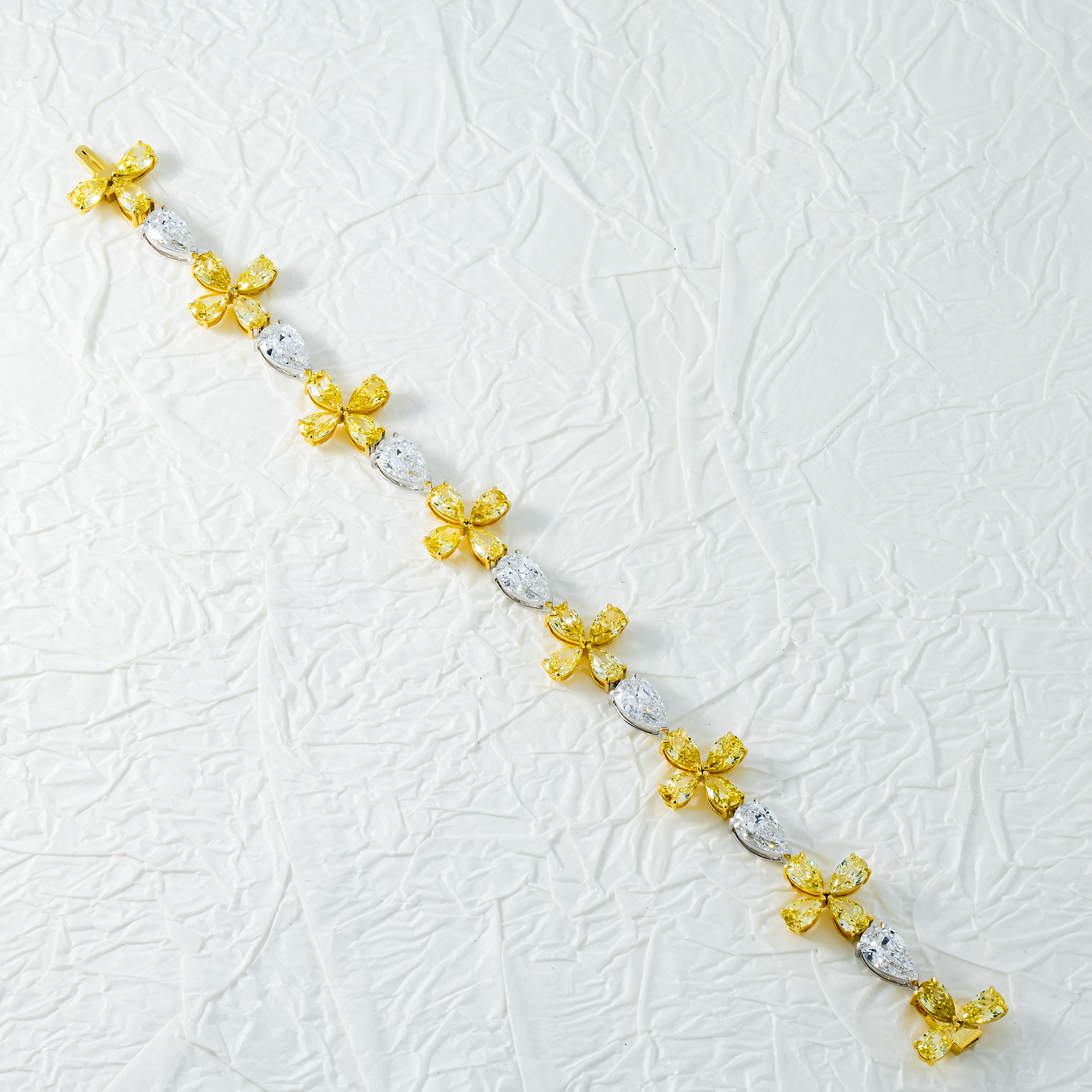 14K Two Tone Pear Cut White & Fancy Yellow Diamond Blooming Bracelet Bracelets