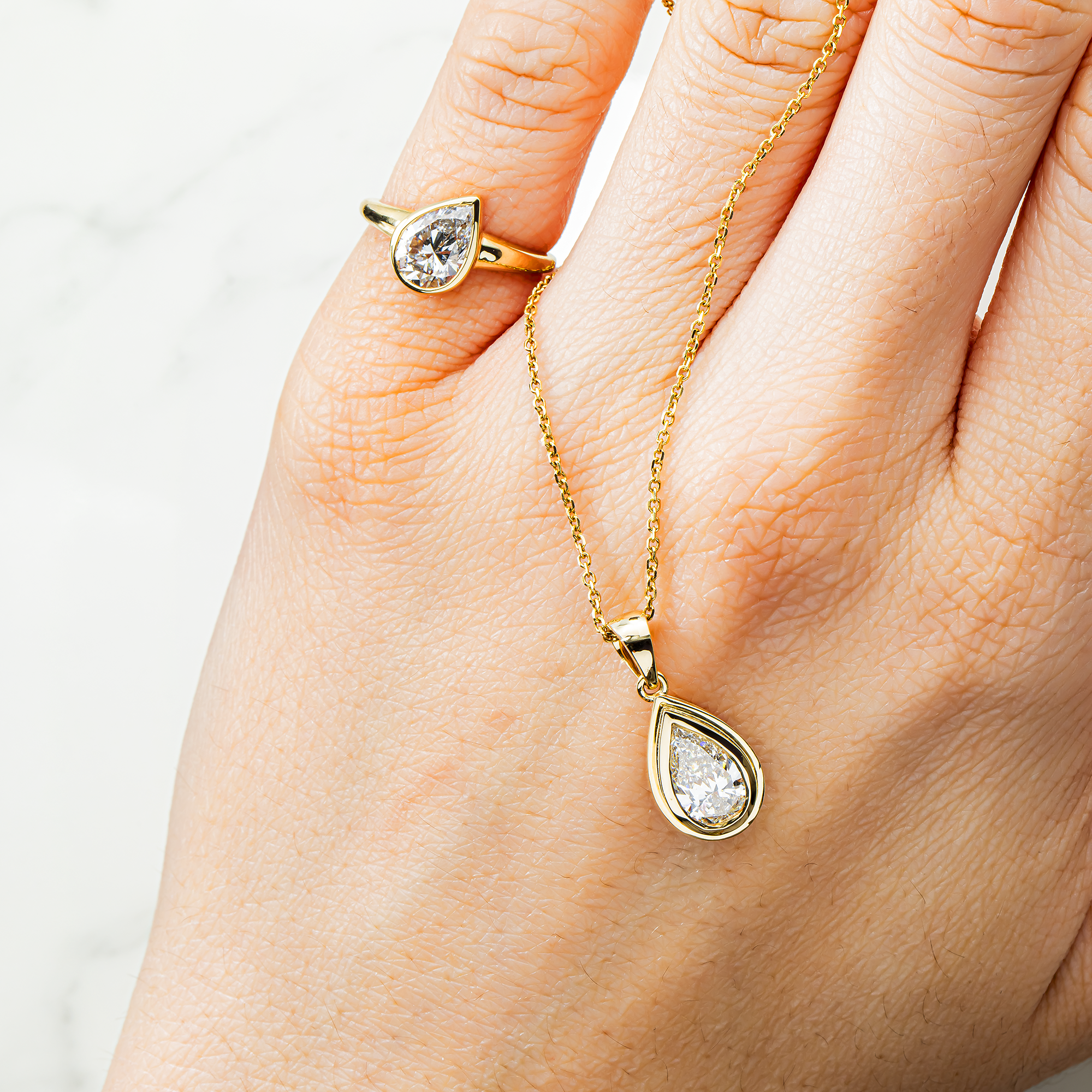 14K Yellow Gold Bezel Set Pear Cut Diamond Ring 1.18ct