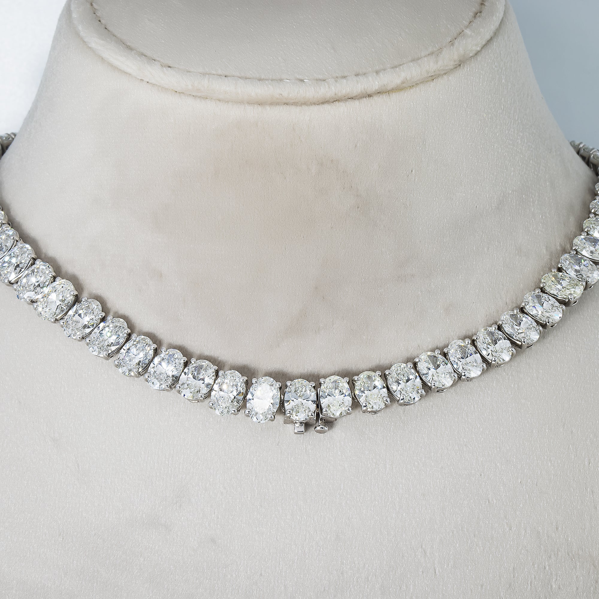 Igi Platinum Slightly Graduated Oval Diamond Tennis Chain 104Ct Chains