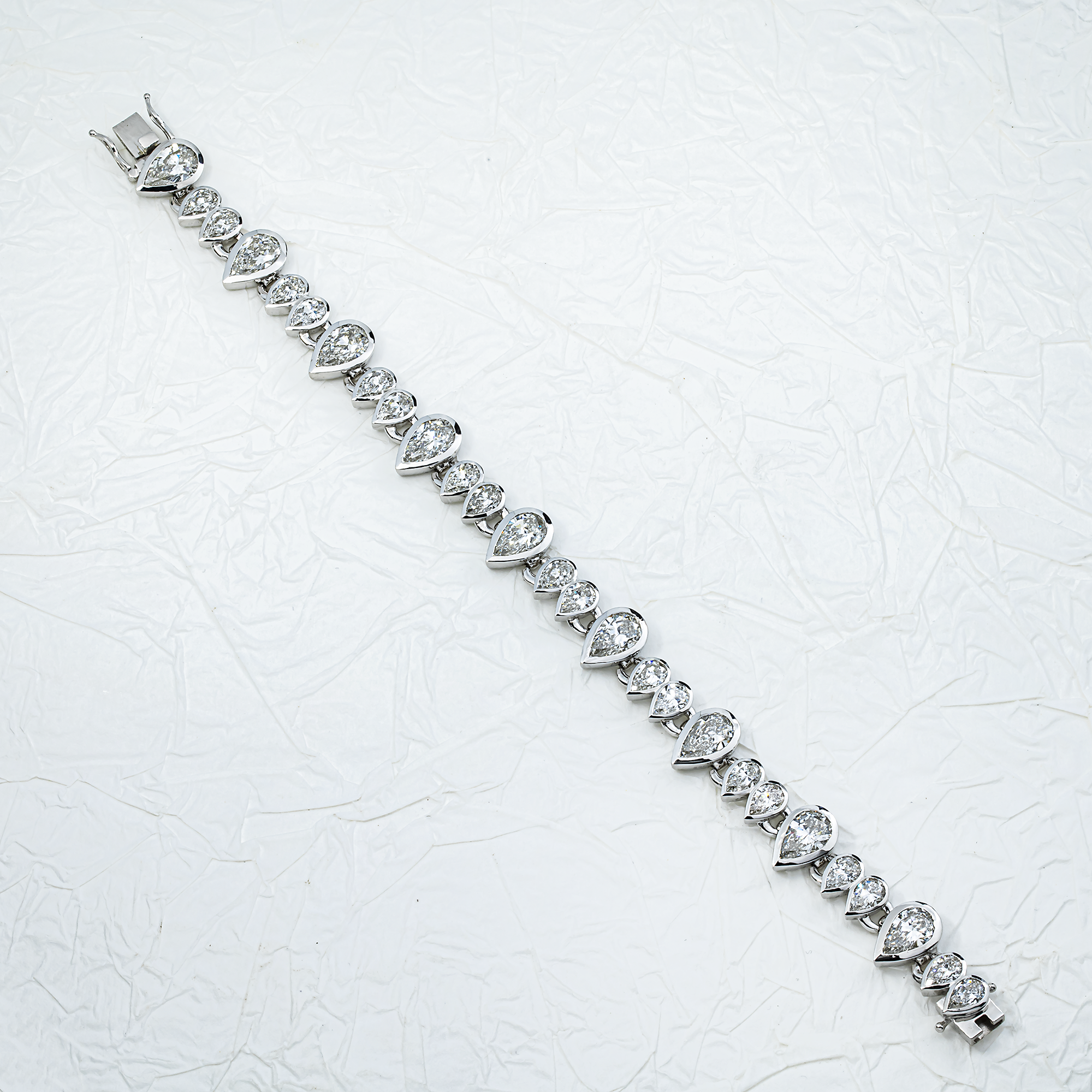 14K White Gold Bezel Set Pear Diamond Bracelet 23.55ct