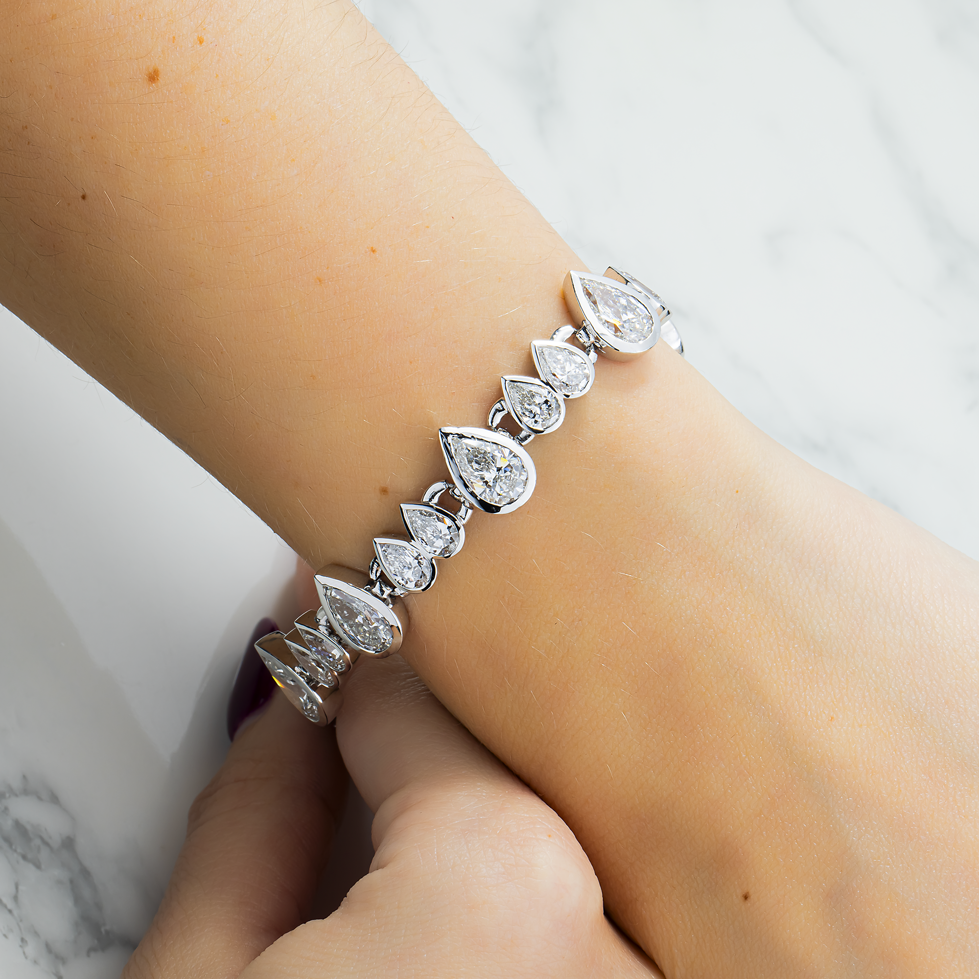 14K White Gold Bezel Set Pear Diamond Bracelet 23.55ct