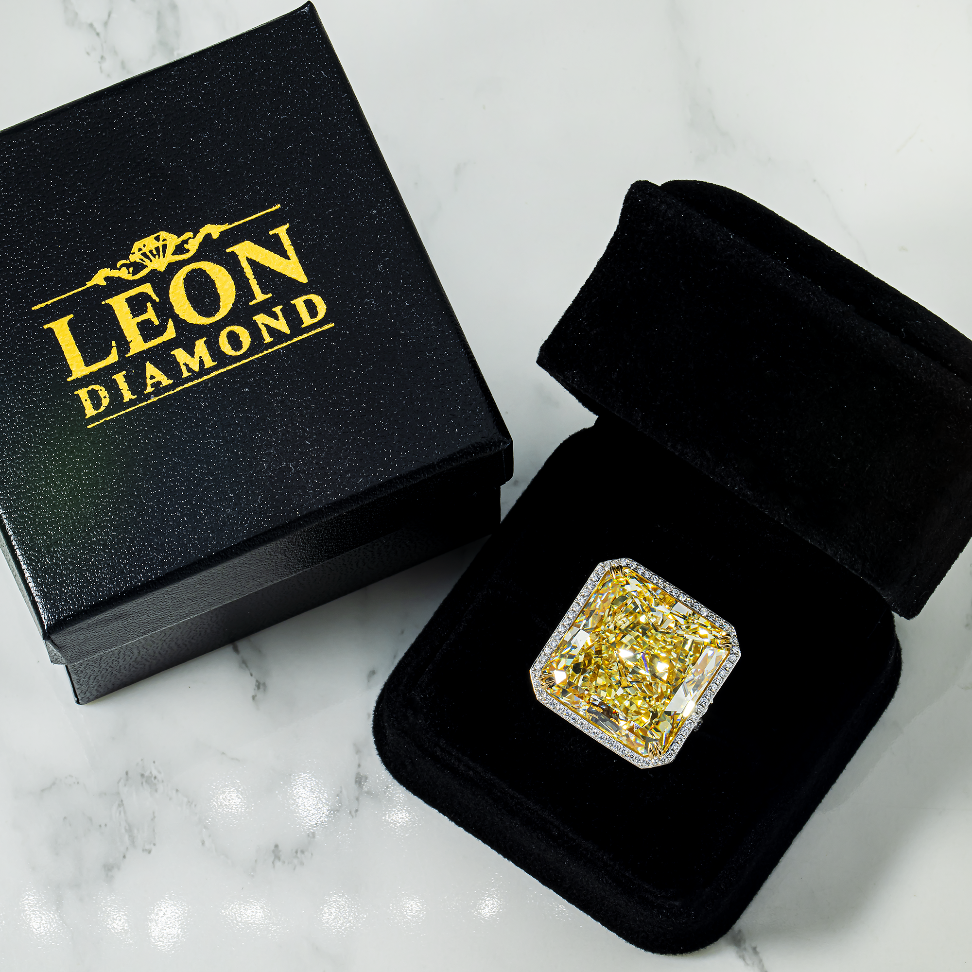 GIA Platinum Radiant Fancy Yellow Diamond Ring 40.05ct