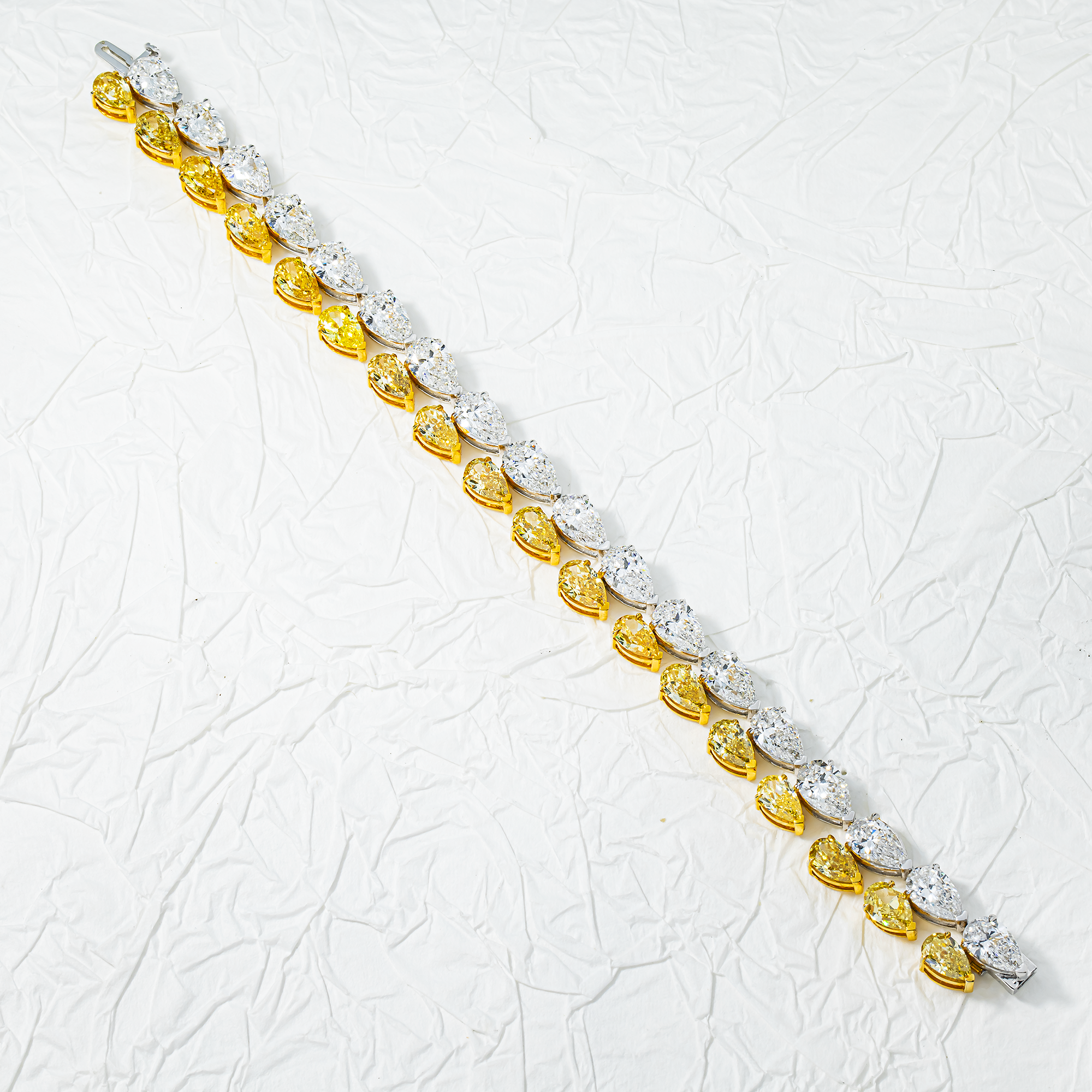 14K Two Tone Pear Cut Fancy Yellow & White Diamond Bracelet 33.38ct