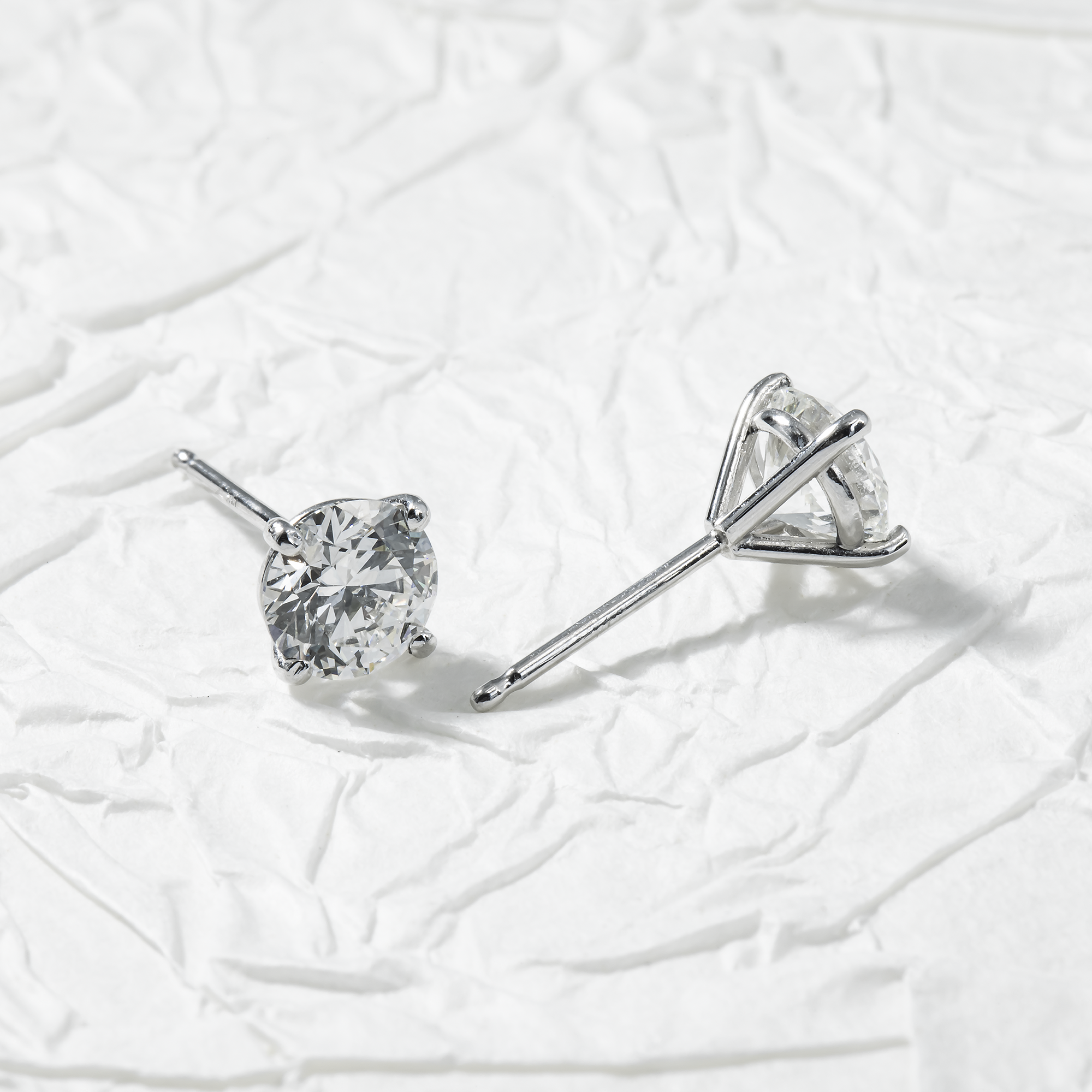 Igi 14K White Gold 1.1Ct Each Solitaire Round Diamond Stud Earrings 2.21Ctw
