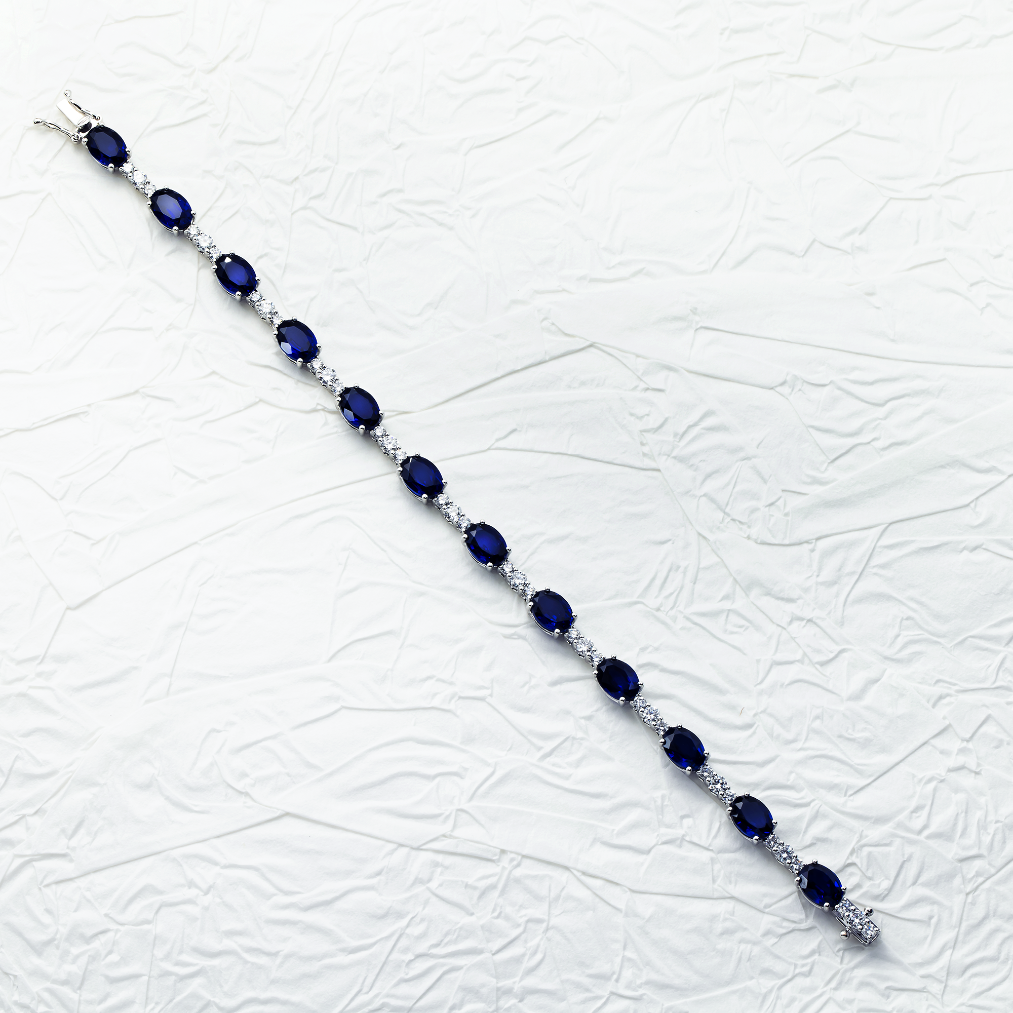 White Gold Oval Cut Sapphire & Round Cut Diamond Bracelet 14.75ctw