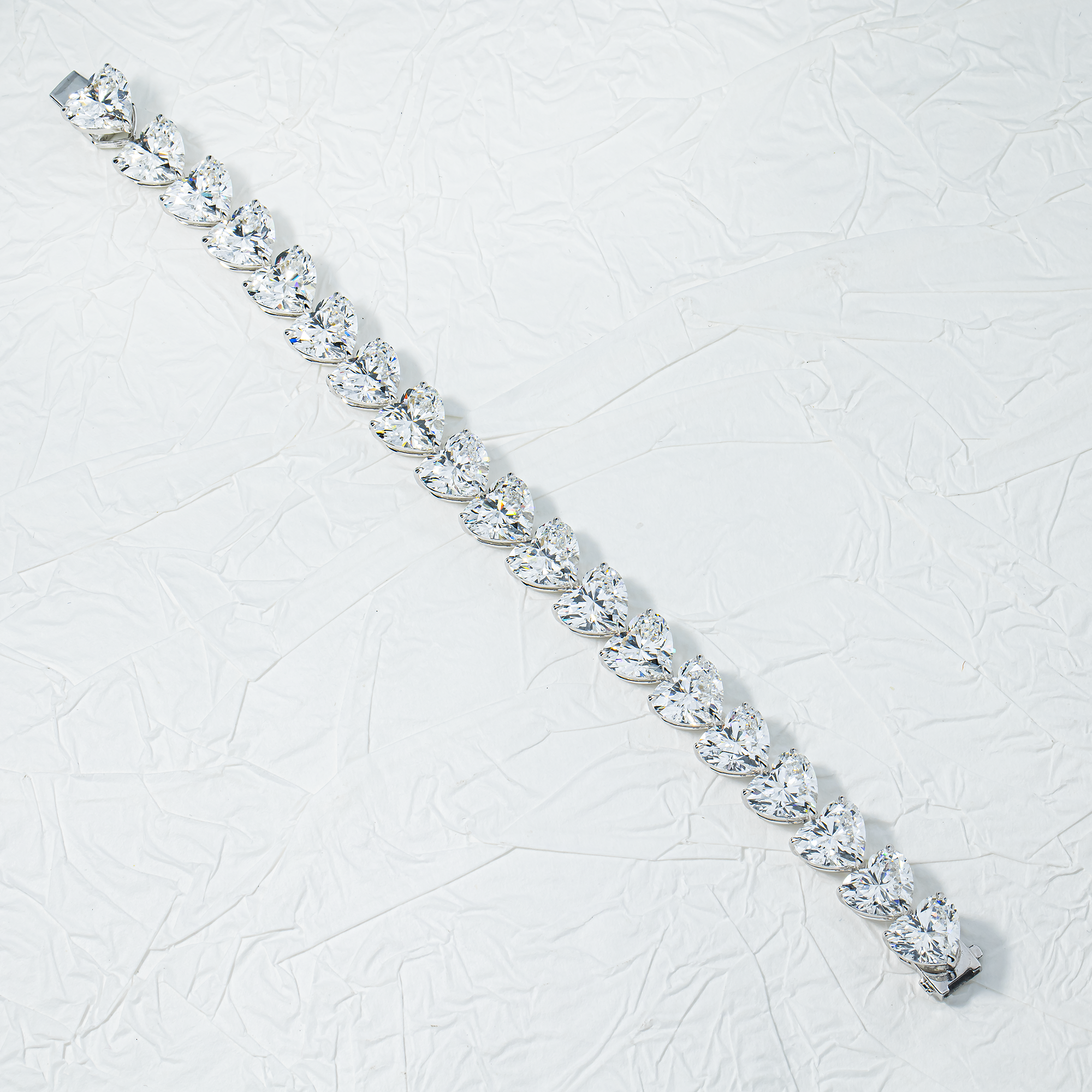 IGI 18K White Gold Heart Cut Diamond Tennis Bracelet 58.13ct