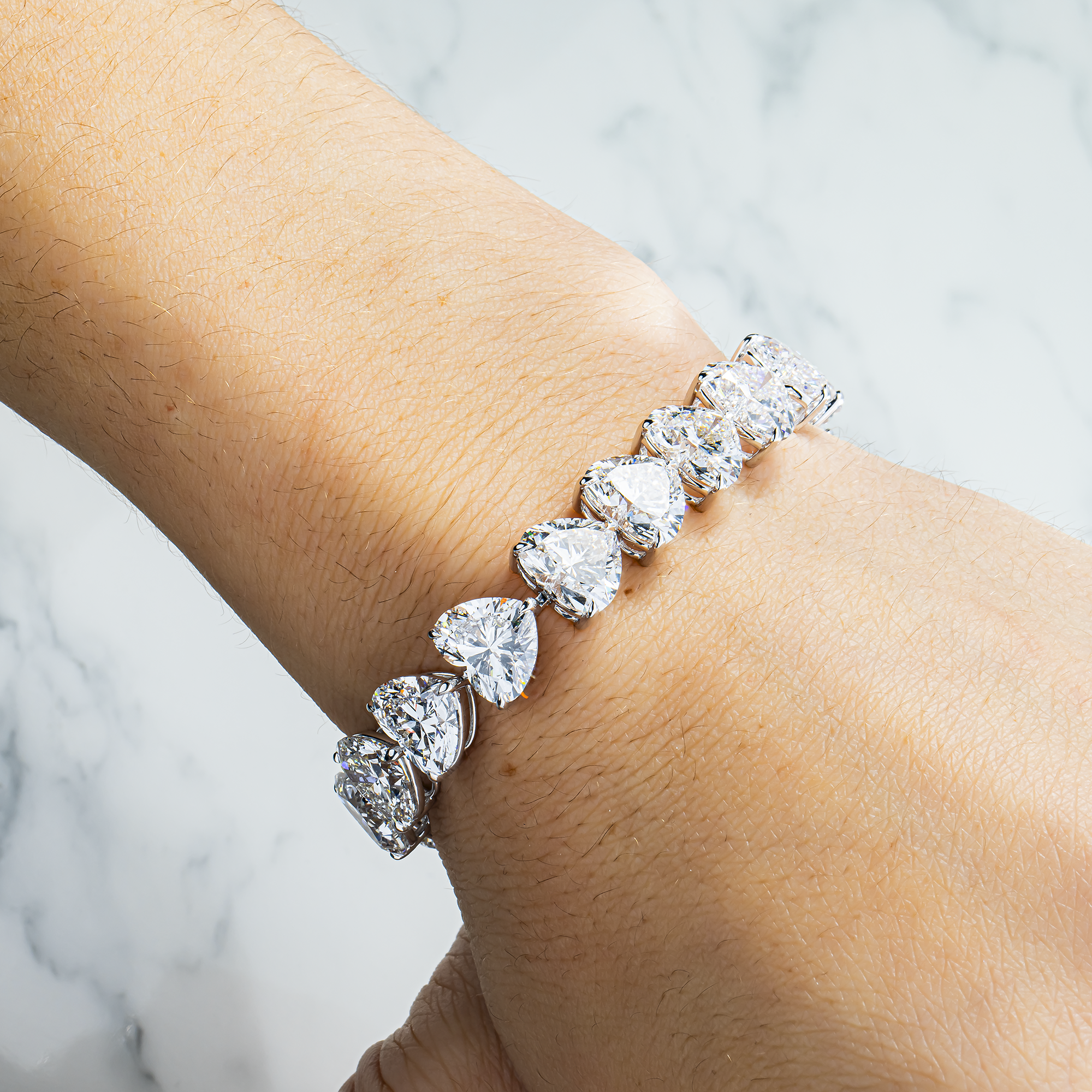 IGI 18K White Gold Heart Cut Diamond Tennis Bracelet 58.13ct