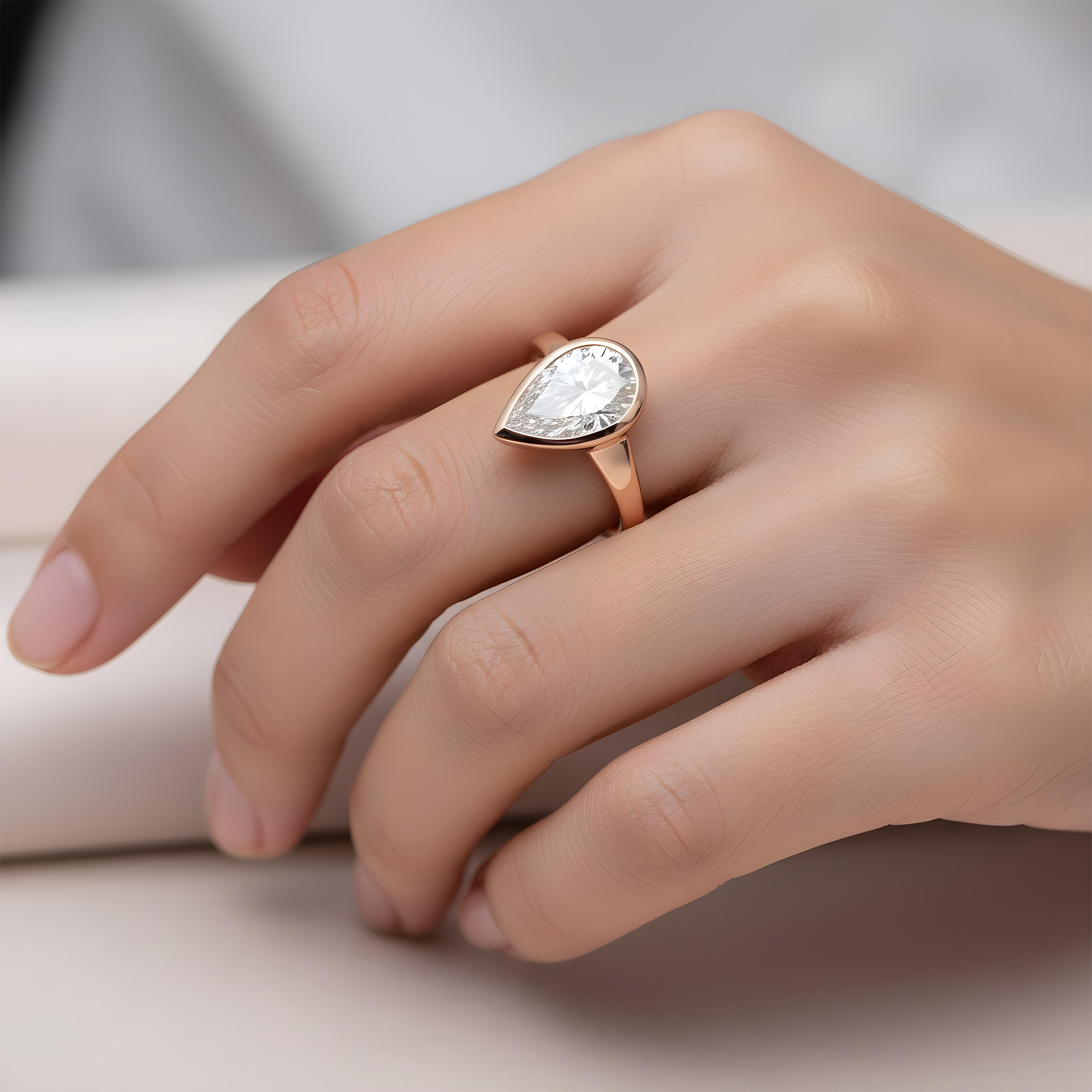 14K Yellow Gold Bezel Set Pear Cut Diamond Ring 1.18ct