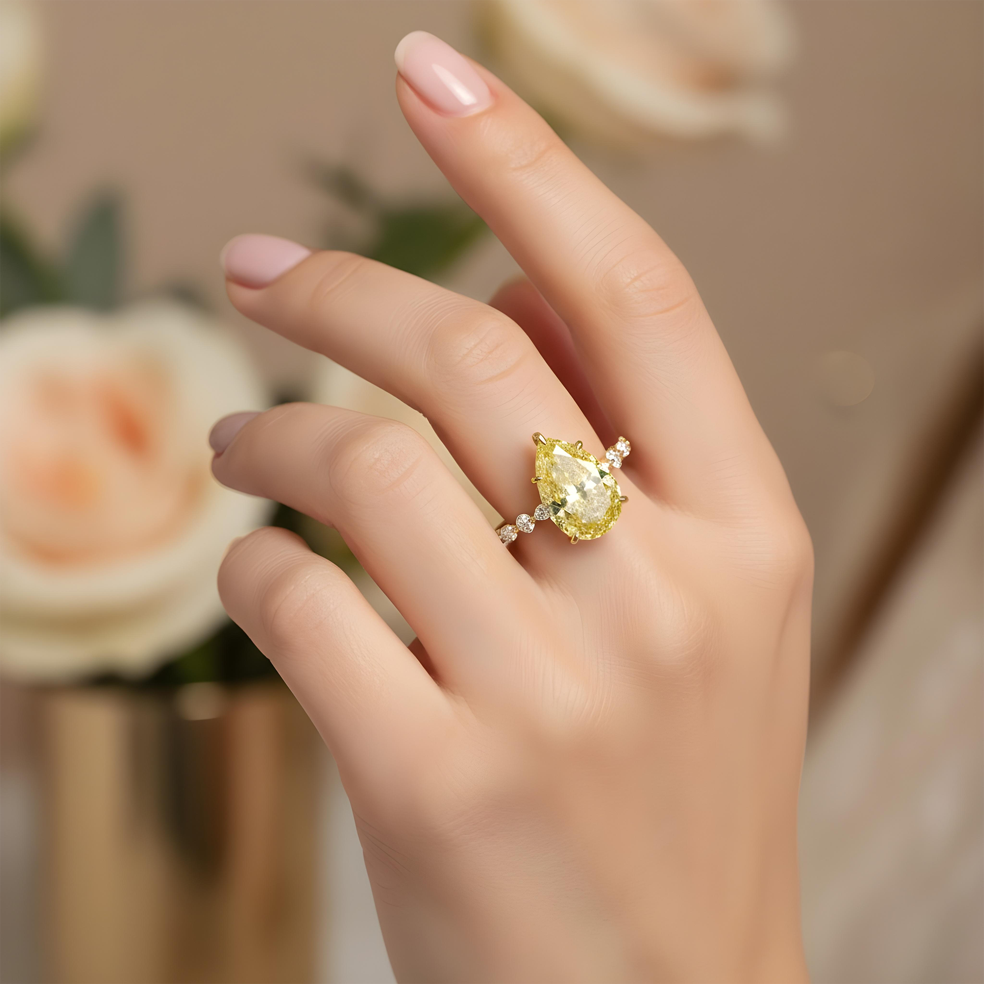 18K White Gold 5.44ct Pear Fancy Yellow Diamond Ring 6.49ctw