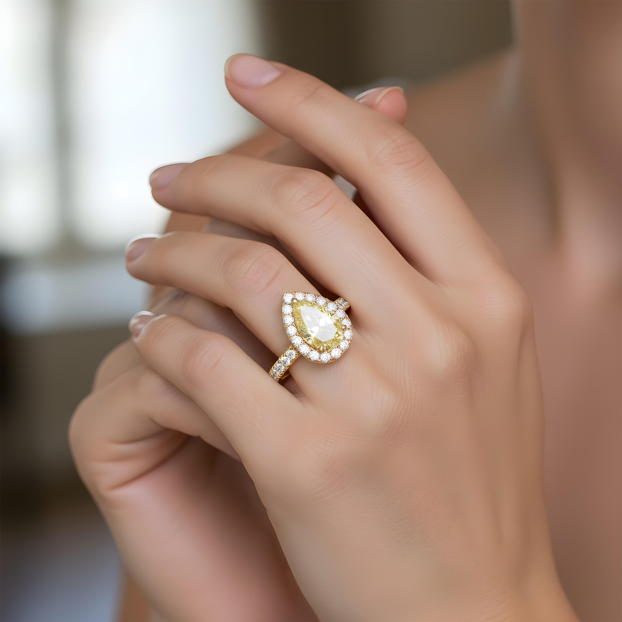 18K White Gold 2.08ct Pear Cut Fancy Vivid Yellow Diamond Ring 2.83ctw
